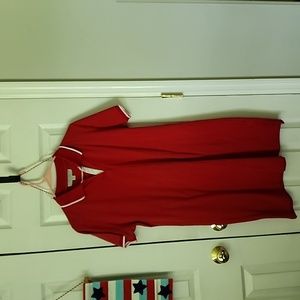 Red with white trim women's pole dress.  No pockets. Size Medium